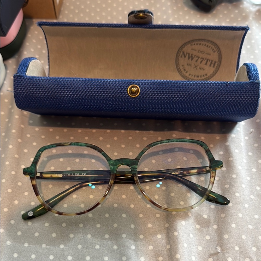 NW 77th Street series frames in green and tortoiseshell